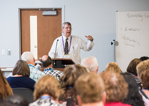 Presenter Bruce Satterfield teaches "The Overall Objective of God's Eternal Plan: What Scripture Tells Us of the Celestial Glory and Kingdom" in the Science and Technology Center.