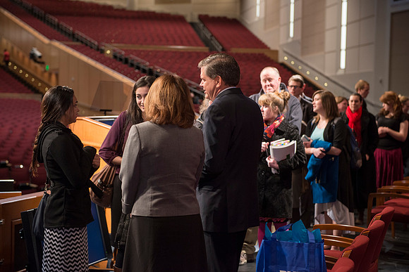 David L. Beck greets students after devotional in the BYU-Idaho Center.