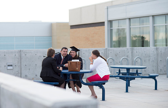 Graduates and family enjoy time between Commencement and Convocation.
