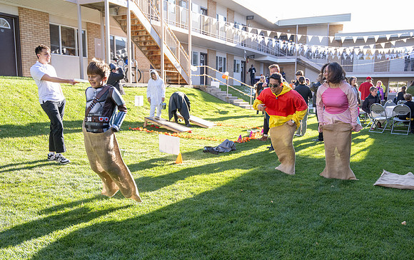 Online Learning and Teaching employees enjoy some Halloween fun at Lamprecht Hall courtyard.