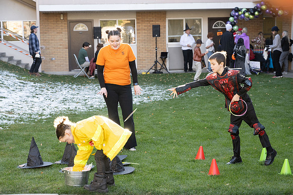 Online Learning and Teaching employees enjoy some Halloween fun at Lamprecht Hall courtyard.