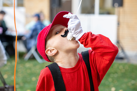 Online Learning and Teaching employees enjoy some Halloween fun at Lamprecht Hall courtyard.