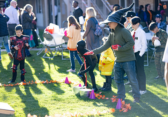 Online Learning and Teaching employees enjoy some Halloween fun at Lamprecht Hall courtyard.