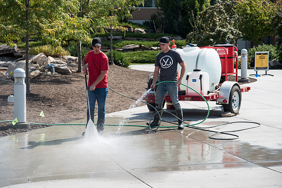 Student employees working on campus with the BYU-Idaho Grounds Crew. September 2018