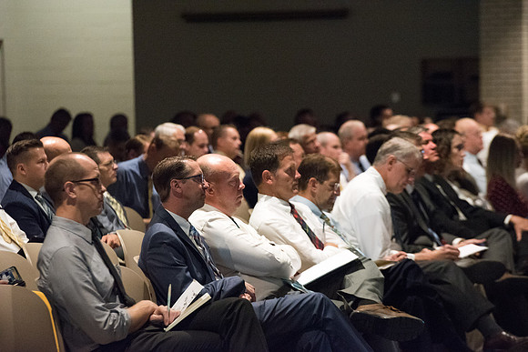 Faculty listening to the speaker at the faculty meeting in the Taylor chapel. Sept 2018