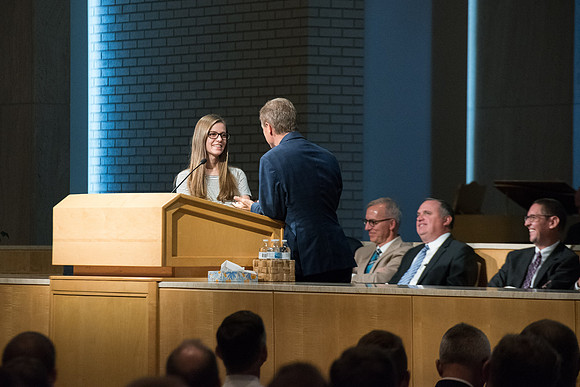 Rob Eaton, Executive Office Associate Academic VP-Instruction does a role play with his daughter at the fall faculty meeting in the Taylor Chapel. Sept 2018