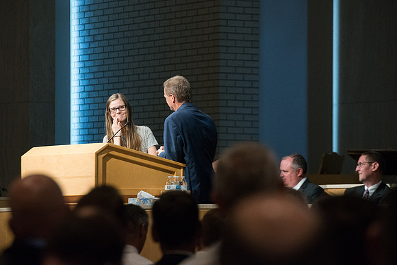Rob Eaton, Executive Office Associate Academic VP-Instruction does a role play with his daughter at the fall faculty meeting in the Taylor Chapel. Sept 2018