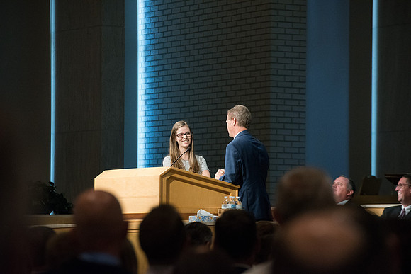 Rob Eaton, Executive Office Associate Academic VP-Instruction does a role play with his daughter at the fall faculty meeting in the Taylor Chapel. Sept 2018