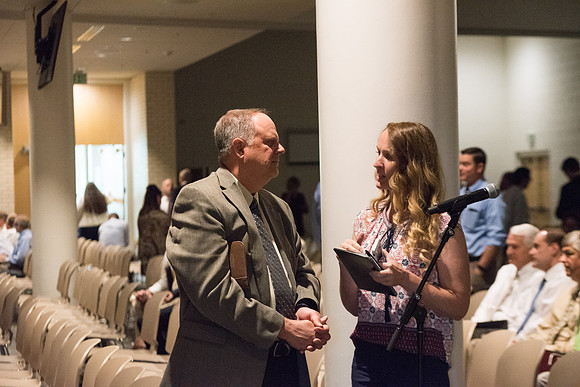 Faculty conversing after the fall faculty meeting in the Taylor Chapel. Sept 2018