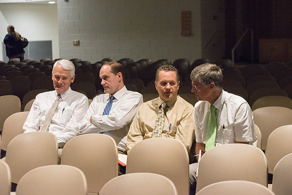 Faculty conversing after the fall faculty meeting in the Taylor Chapel. Sept 2018