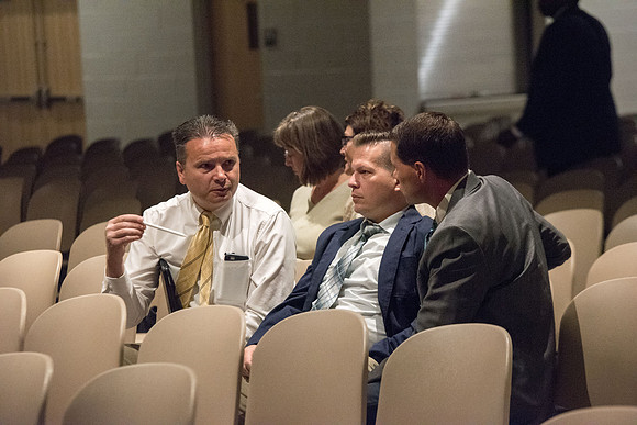 Faculty conversing after the fall faculty meeting in the Taylor Chapel. Sept 2018