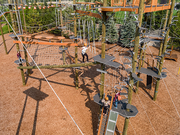 Aerial drone shots of ropes course.