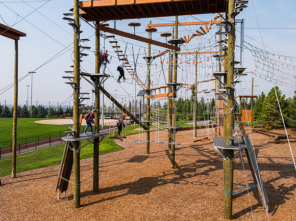 Aerial drone shots of ropes course.