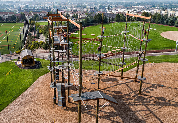Aerial drone shots of ropes course.