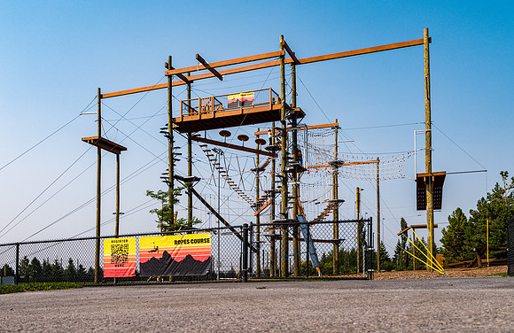 Aerial drone shots of ropes course.