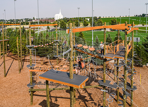 Aerial drone shots of ropes course.