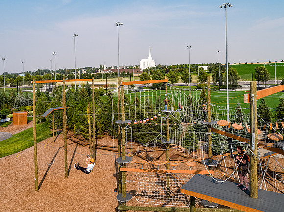 Aerial drone shots of ropes course.