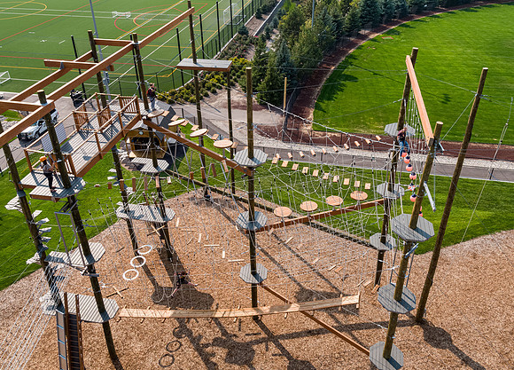 Aerial drone shots of ropes course.