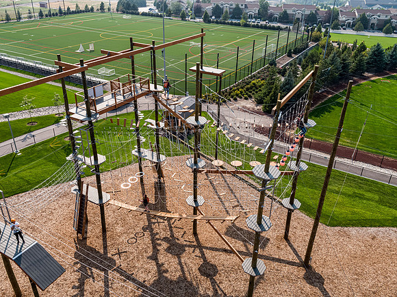 Aerial drone shots of ropes course.
