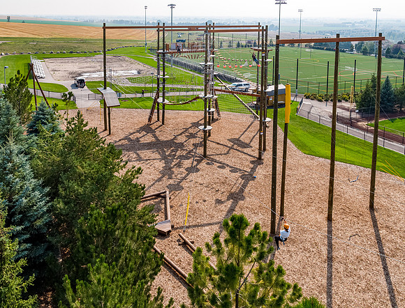 Aerial drone shots of ropes course.