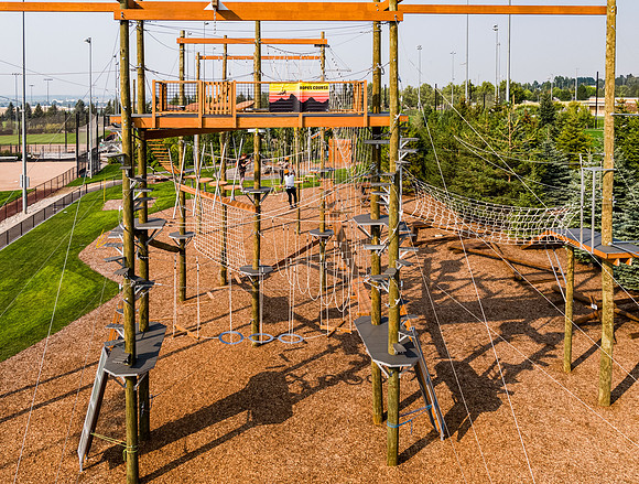 Aerial drone shots of ropes course.