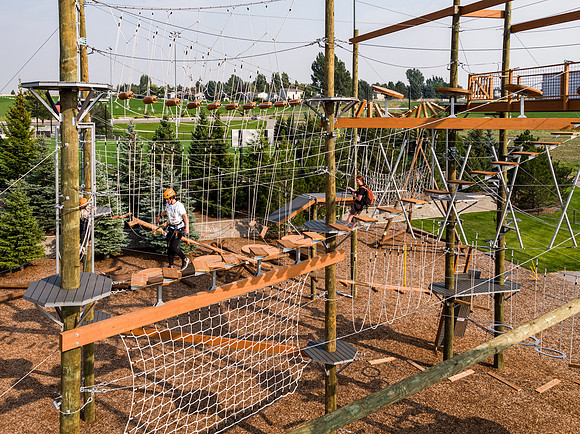Aerial drone shots of ropes course.