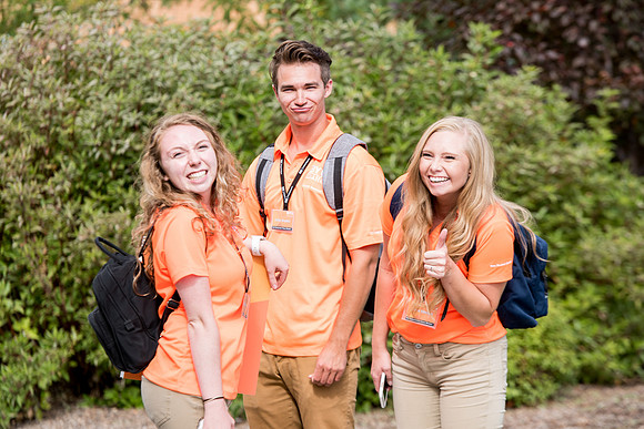 Student mentors on campus helping new students.