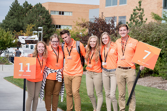 Student mentors on campus helping new students.