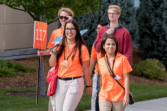 Student mentors on campus helping new students.
