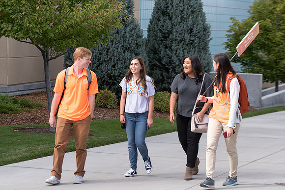 Student mentors on campus helping new students.