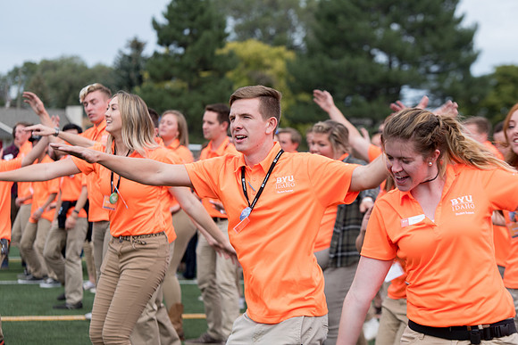 Students make new friends and get acquainted with other new students in their I-Team at the Football Field