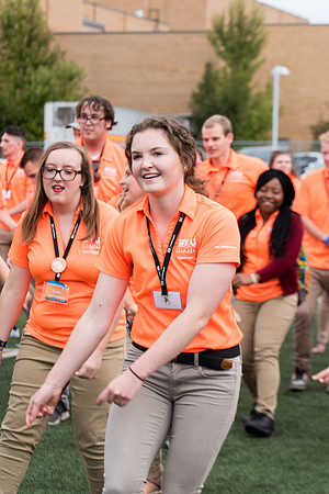 Students make new friends and get acquainted with other new students in their I-Team at the Football Field