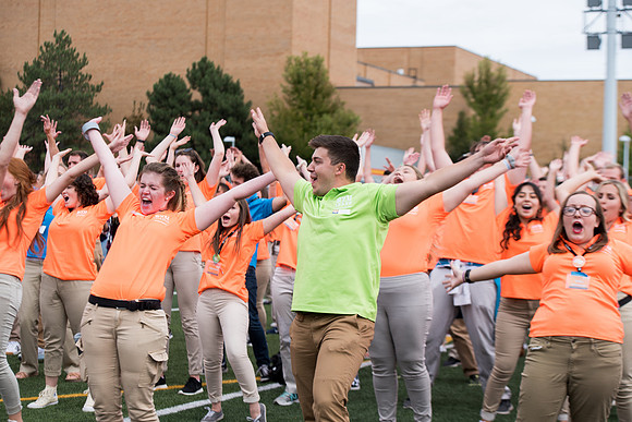 Students make new friends and get acquainted with other new students in their I-Team at the Football Field