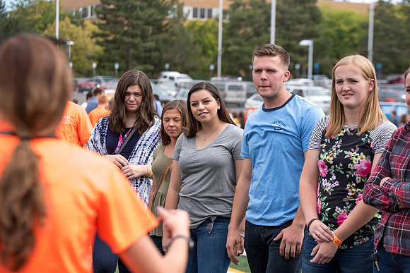 Students make new friends and get acquainted with other new students in their I-Team at the Football Field