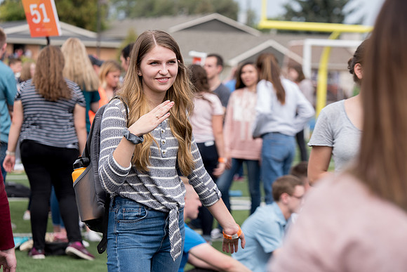 Students make new friends and get acquainted with other new students in their I-Team at the Football Field