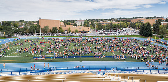 Students make new friends and get acquainted with other new students in their I-Team at the Football Field