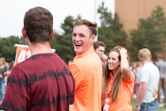 Students make new friends and get acquainted with other new students in their I-Team at the Football Field