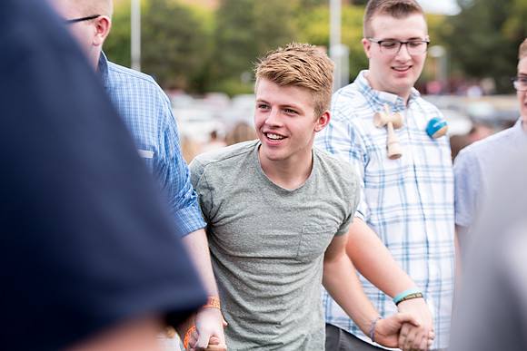 Students make new friends and get acquainted with other new students in their I-Team at the Football Field
