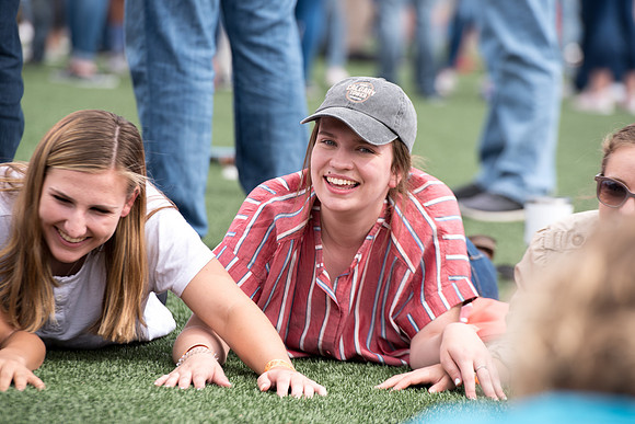 Students make new friends and get acquainted with other new students in their I-Team at the Football Field