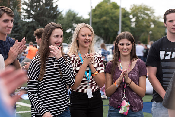 Students make new friends and get acquainted with other new students in their I-Team at the Football Field