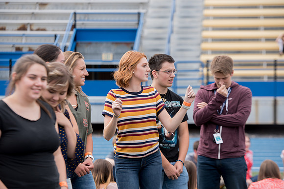 Students make new friends and get acquainted with other new students in their I-Team at the Football Field