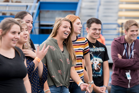 Students make new friends and get acquainted with other new students in their I-Team at the Football Field