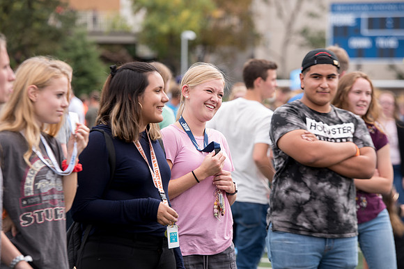 Students make new friends and get acquainted with other new students in their I-Team at the Football Field