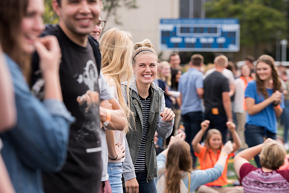 Students make new friends and get acquainted with other new students in their I-Team at the Football Field