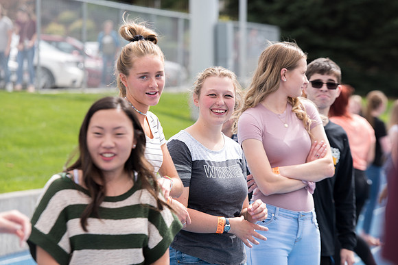 Students make new friends and get acquainted with other new students in their I-Team at the Football Field