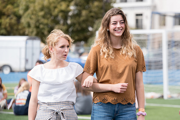 Students make new friends and get acquainted with other new students in their I-Team at the Football Field
