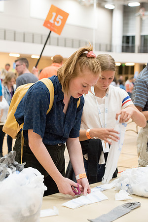 Students are assembling hygiene kits, braiding jump ropes and making plarn for plastic sleep mats.