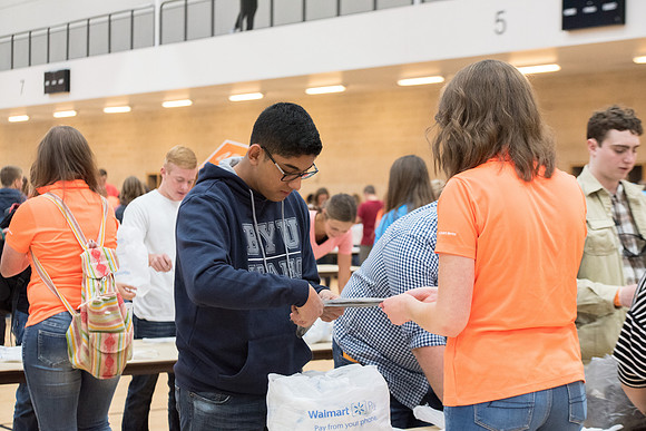 Students are assembling hygiene kits, braiding jump ropes and making plarn for plastic sleep mats.