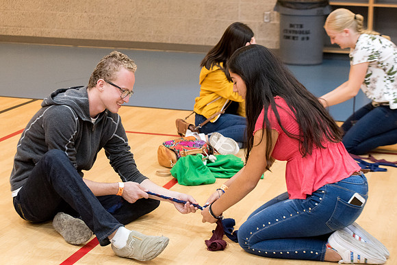 Students are assembling hygiene kits, braiding jump ropes and making plarn for plastic sleep mats.