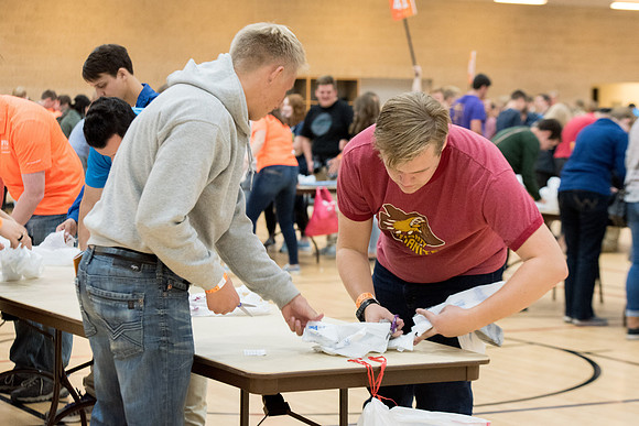 Students are assembling hygiene kits, braiding jump ropes and making plarn for plastic sleep mats.